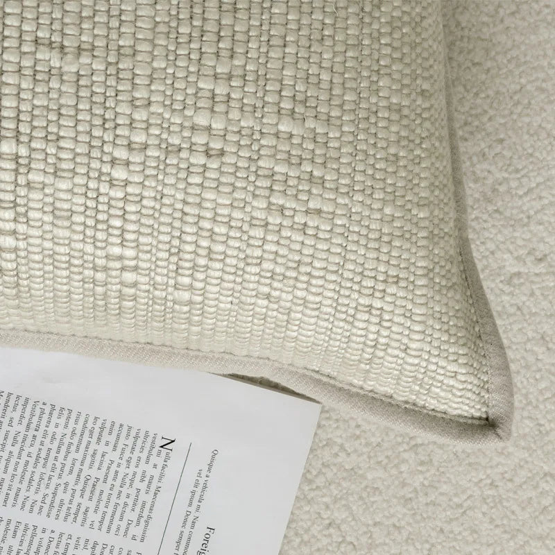 Housse de coussin ivoire texturée