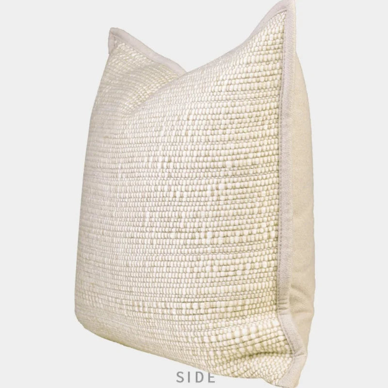 Housse de coussin ivoire texturée
