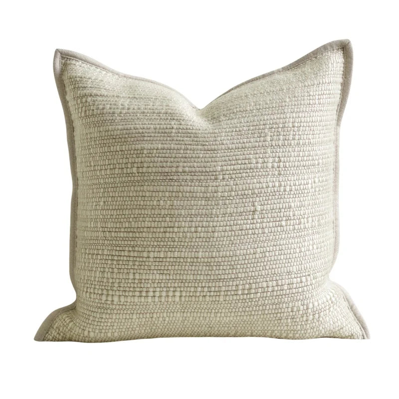 Housse de coussin ivoire texturée