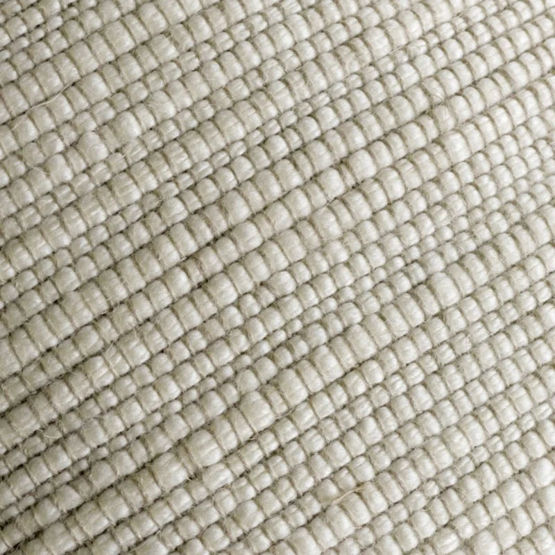 Housse de coussin ivoire texturée